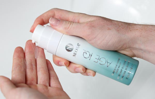 Image of Double-Cleansing Face Wash between hands. 